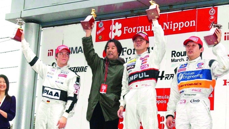 Andre Lotterer Satoshi Motoyama and Toshihiro Kaneishi on Formula Nippon podium 2003