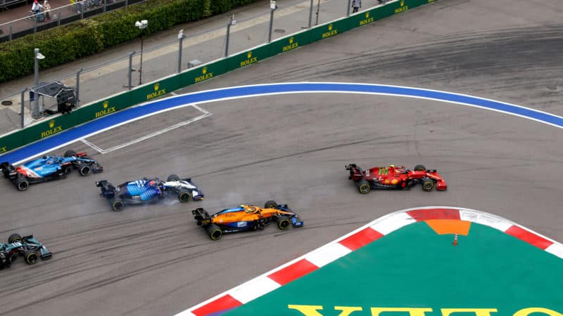 Carlos Sainz leads at the satrt of 2021 Russian Grand Prix