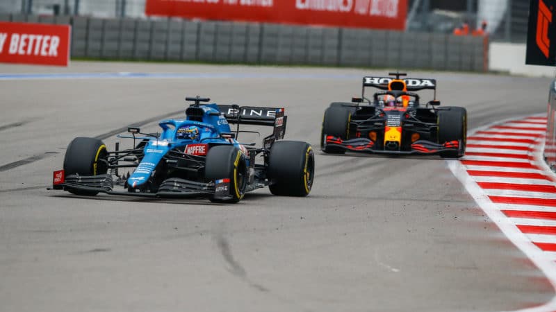 Fernando Alonso passes Max Verstappen in the 2021 Russian Grand Prix