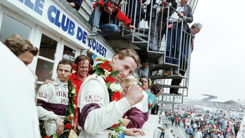Johnny Dumfries celebrates Le Mans win in 1988