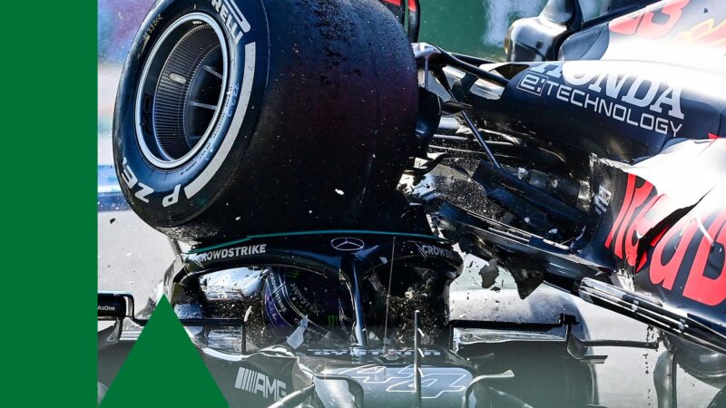 TOPSHOT - Mercedes' British driver Lewis Hamilton (L) and Red Bull's Dutch driver Max Verstappen collide during the Italian Formula One Grand Prix at the Autodromo Nazionale circuit in Monza, on September 12, 2021. (Photo by ANDREJ ISAKOVIC / AFP) (Photo by ANDREJ ISAKOVIC/AFP via Getty Images)