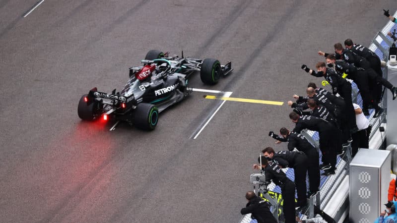 Lewis Hamilton cheered by his Mercedes team as he wins the 2021 Russian Grand Prix