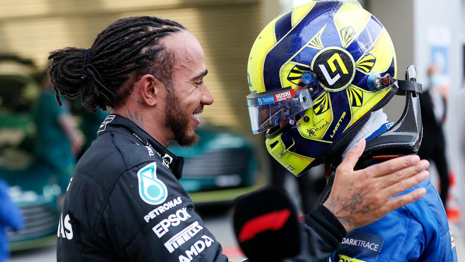 Lewis Hamilton talks to Lando Norris after winning the 2021 Russian Grand Prix