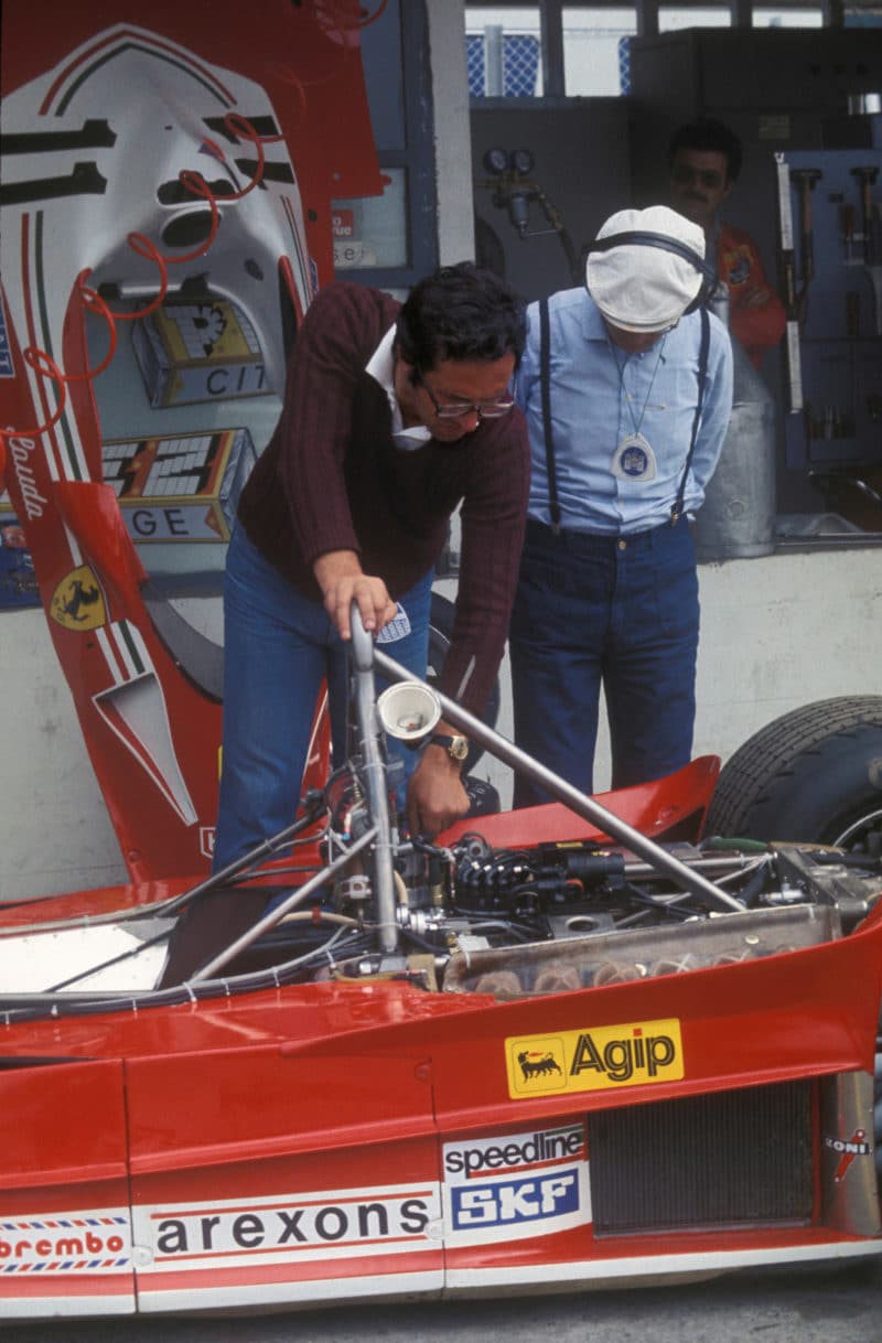 Mauro-Forghieri-inspects-Ferrari-V12-engine