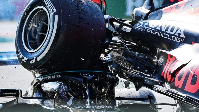 Max Verstappen' Red Bul wheel hits head of Lewis Hamilton