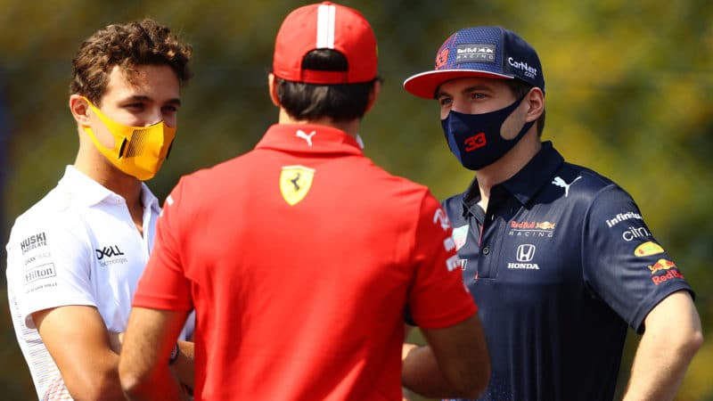 Max Verstappen talks with Lando Norris and Charles Leclerc at monza 2021