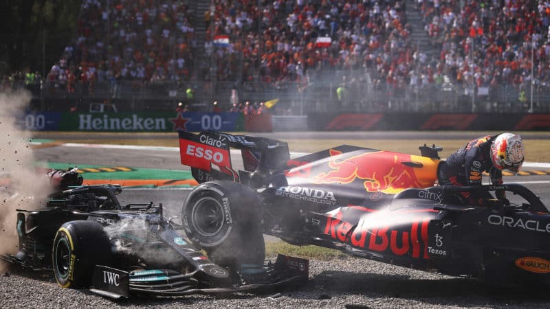 Max Verstappen climbs out of his Reb Bull after Hamilton Monza crash