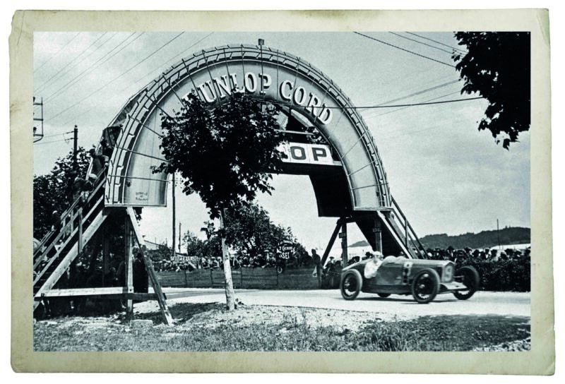 Robert-Benoist-in-Delage-V12-under-Dunlop-Bridge-at-Lyon