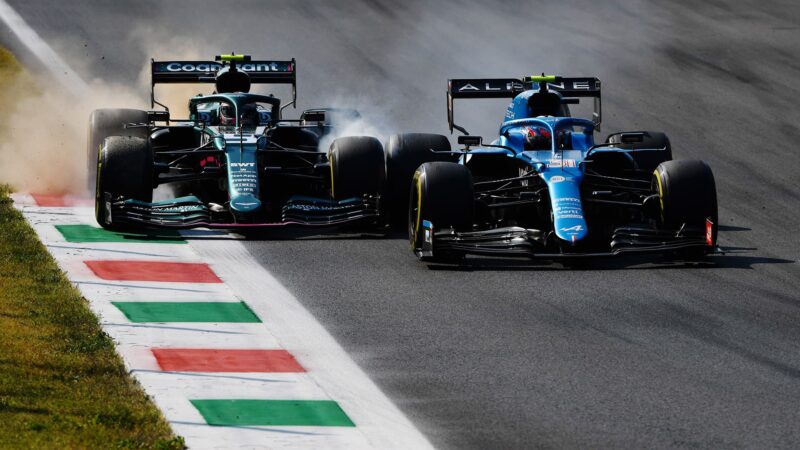 Sebastian Vettel locks up next to Esteban ocon at monza