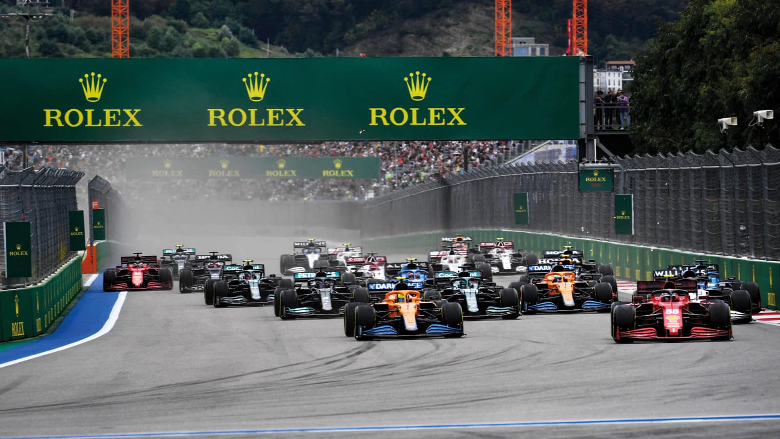 Carlos Sainz leads at the start of the 2021 Russian Grand Prix