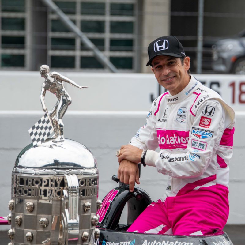 Helio Castroneves with Indy 500 trophy copy
