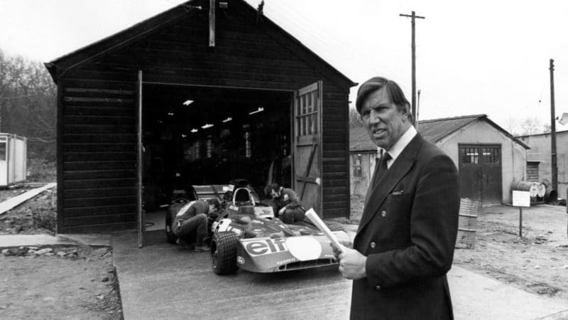Ken Tyrrell outside his factory shed