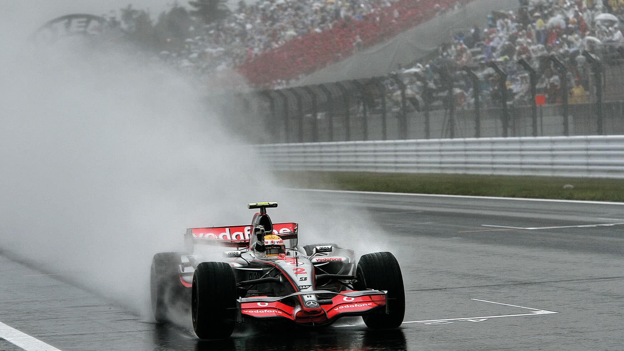 Lewis Hamilton crosses the line to win the 2007 Japanese Grand Prix