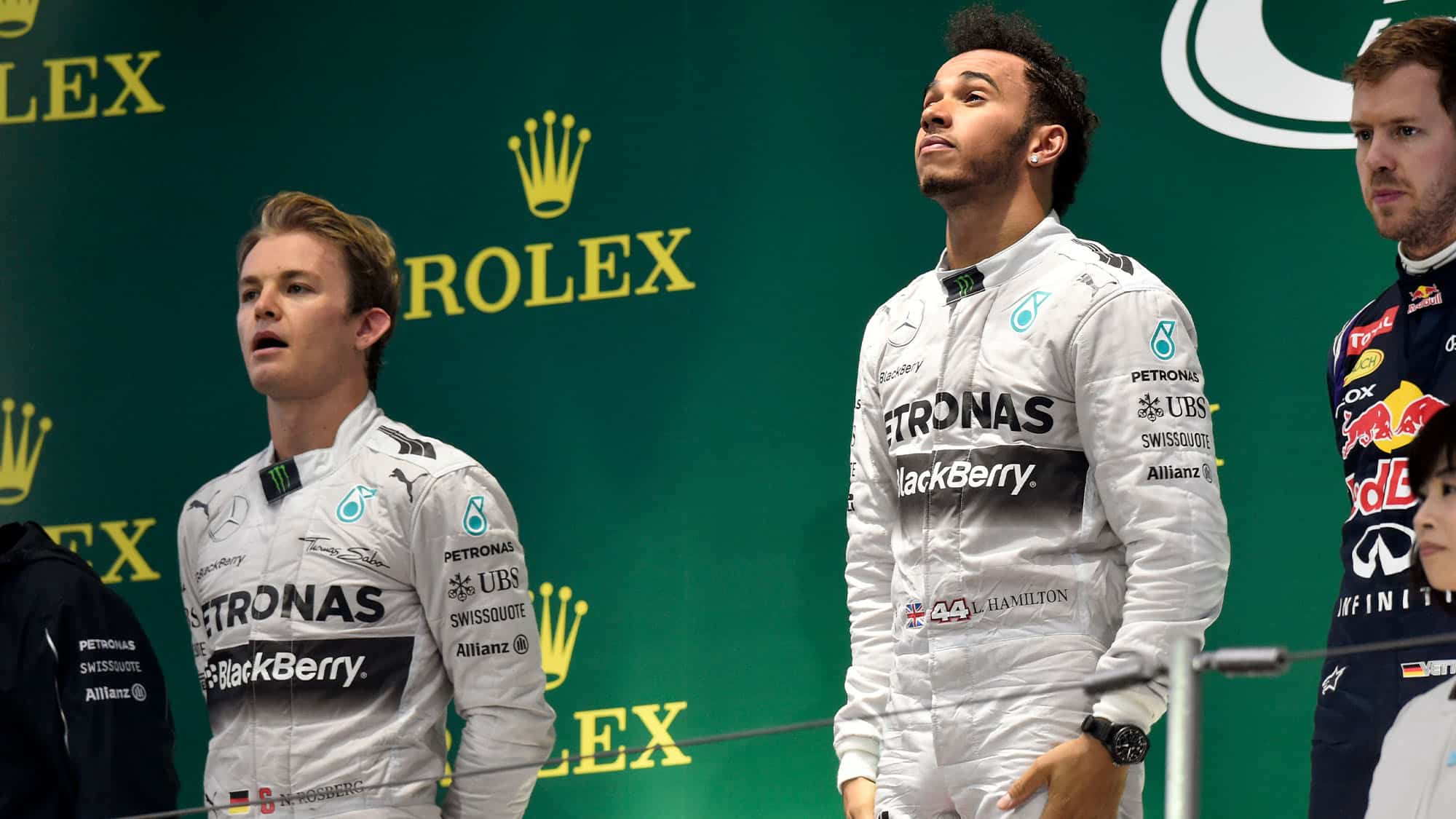 Lewis Hamilton on the podium with Rosberg and Vettel at the 2014 Japanese Grand Prix