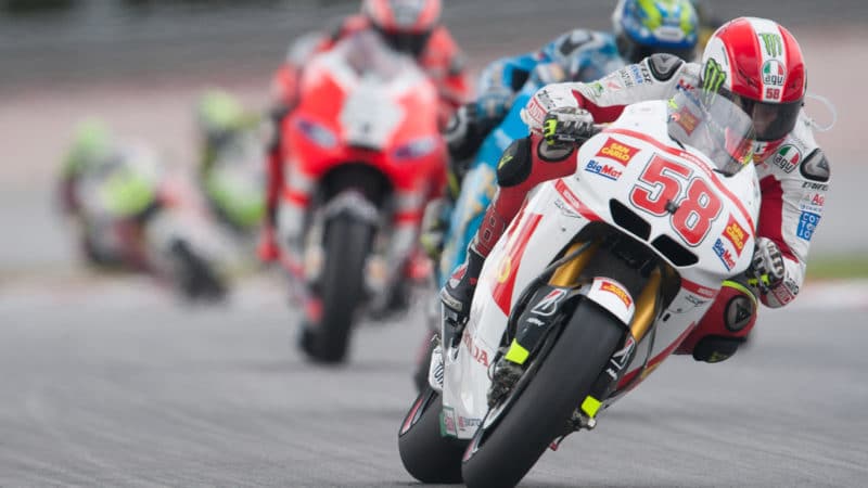 Marco Simoncelli leading in Sepang 2011