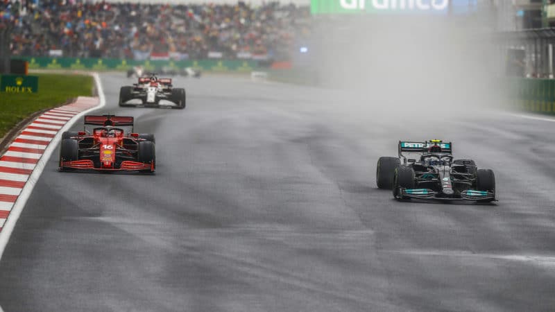 Valtteri Bottas passes Charles Leclerc for the lead of the 2021 Tuyrkish Grand Prix