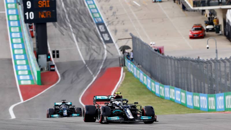 Valtteri Bottas and Lewis Hamilton climb the hill to Turn 1 at Circuit of the Americas