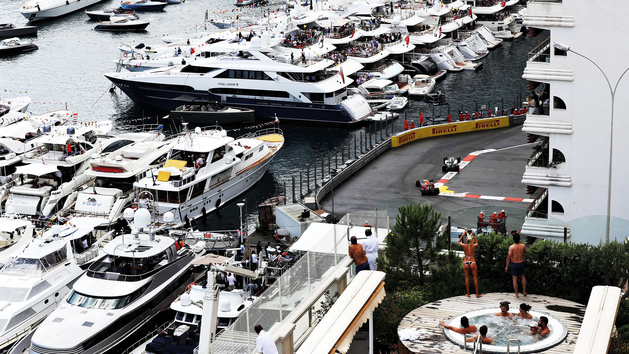 View over Monaco harbour as Lewis Hamilton leads Daniel Ricciardo