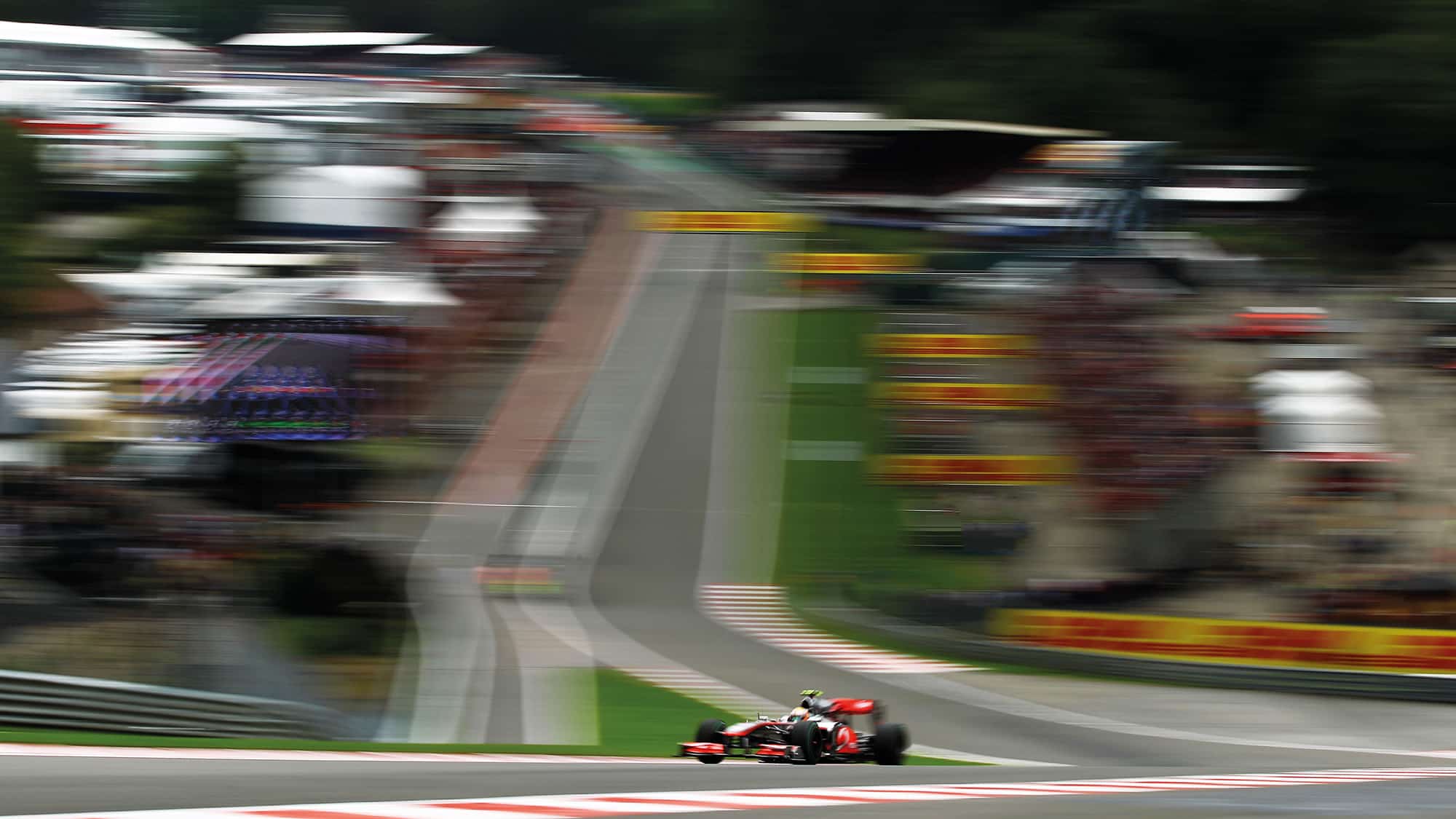 ewis Hamilton climbs up from Eau Rouge in the 2010 Belgian Grand Prix