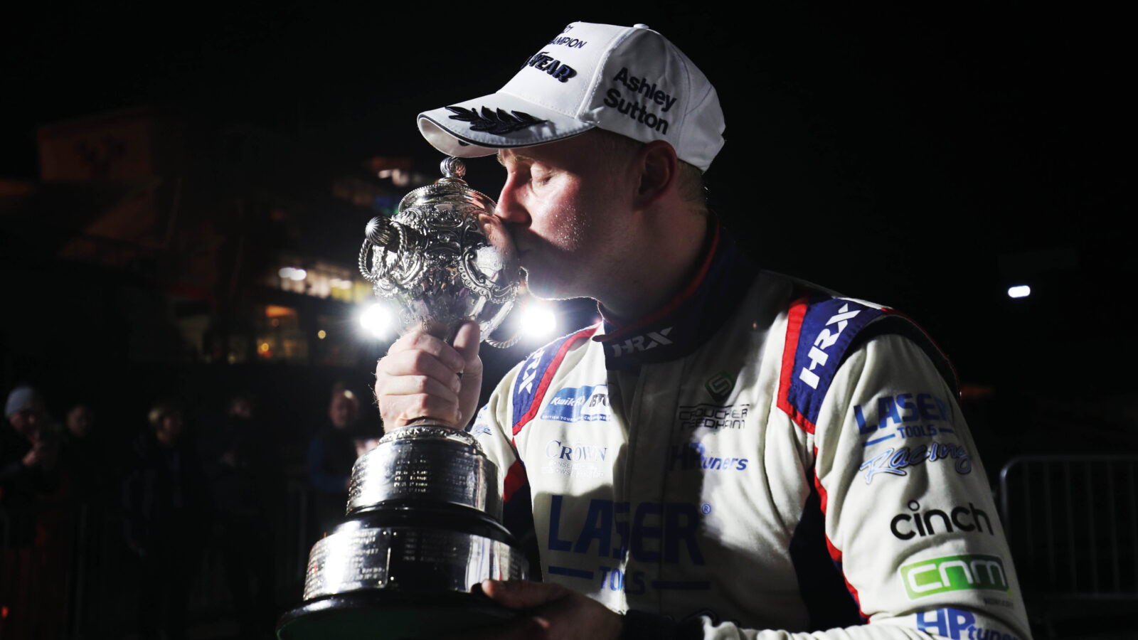 Ash Sutton holds BTCC trophy after his third championship win