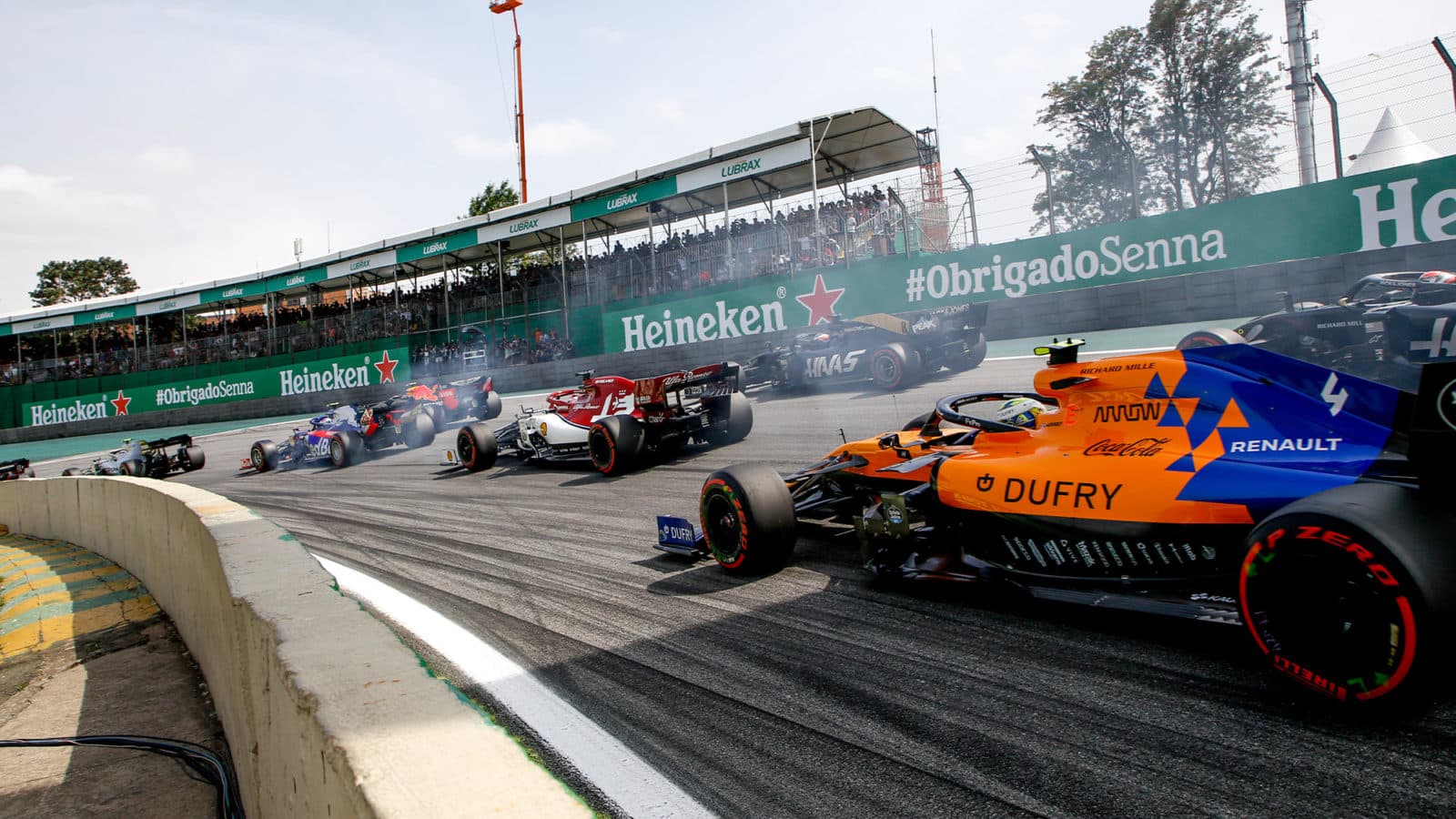 Cars head to Turn 1 at interlagos in the 2019 Brazilian Grand Prix