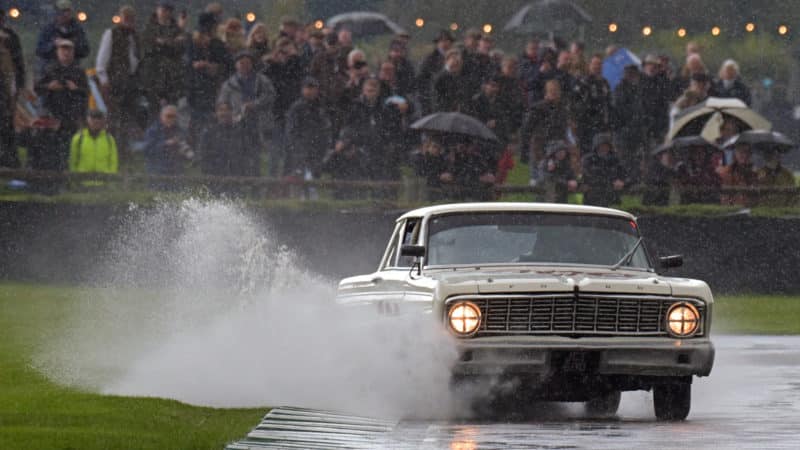 Ford Falcon splashes through puddle at Goodwood