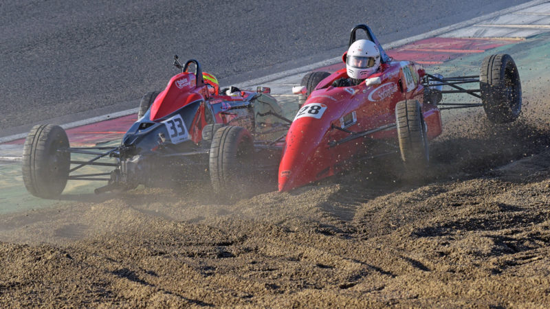 Formula Ford cars in the gravel at Brands Hatch