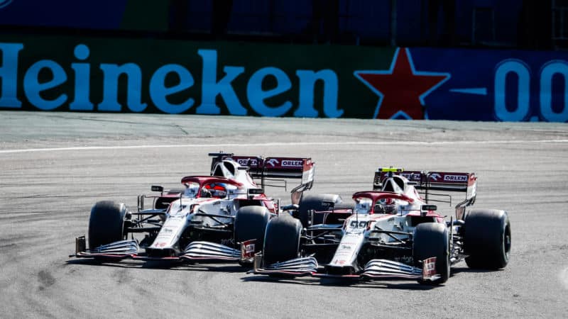 Kimi Raikkonen fights with Antonio Giovinazzi in the 2021 Brazilian Grand Prix