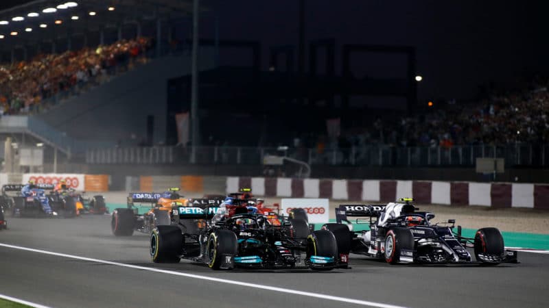 Lewis Hamilton alongside Pierre Gasly at the start of the 2021 Qatar Grand Prix