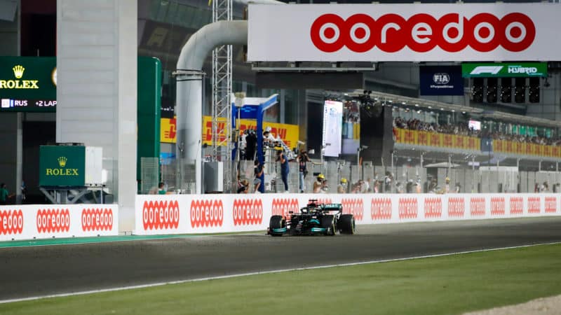 Lewis Hamilton crosses the line to win the 2021 Qatar Grand Prix