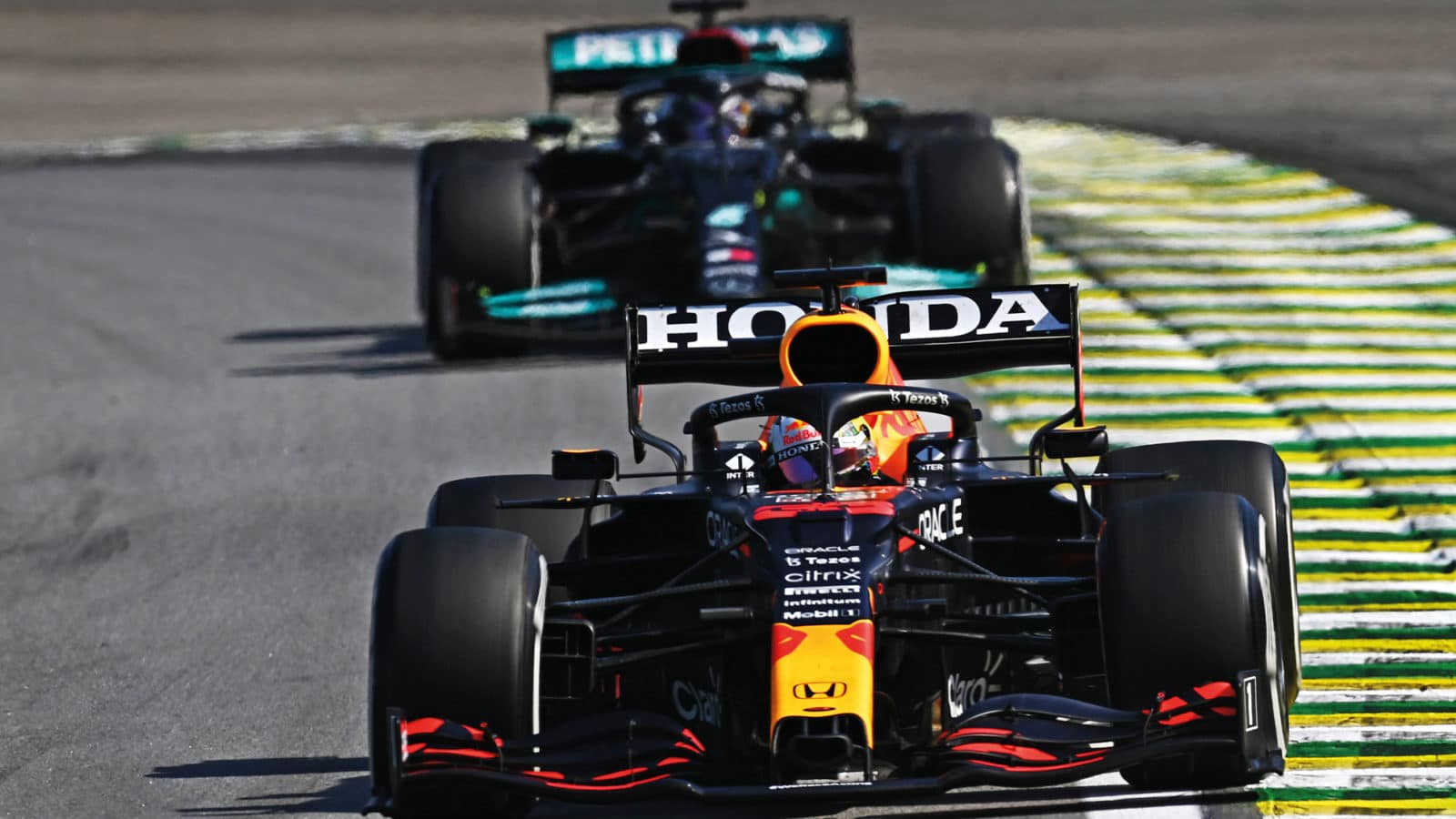 Lewis Hamilton follows Max Verstappen on track