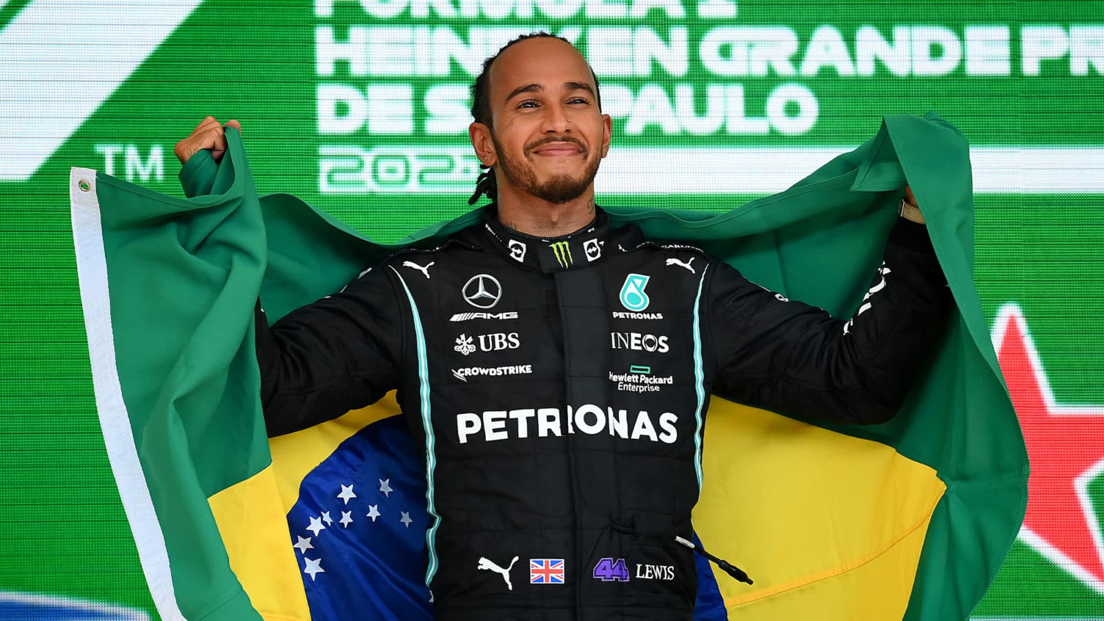 Lewis Hamilton with a Brazilian flag at the 2021 grand prix