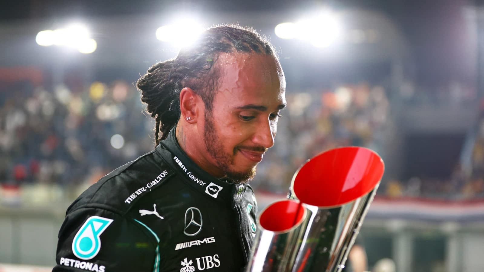 Lewis Hamilton with trophy after winning the 2021 Qatar Grand Prix