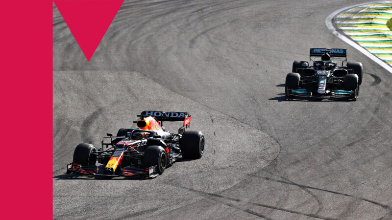 SAO PAULO, BRAZIL - NOVEMBER 14: Max Verstappen of the Netherlands driving the (33) Red Bull Racing RB16B Honda leads Lewis Hamilton of Great Britain driving the (44) Mercedes AMG Petronas F1 Team Mercedes W12 during the F1 Grand Prix of Brazil at Autodromo Jose Carlos Pace on November 14, 2021 in Sao Paulo, Brazil. (Photo by Mark Thompson/Getty Images)