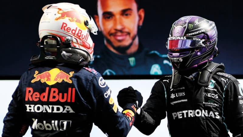 Max Verstappen and Lewis Hamilton shake hands