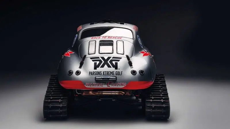 Rear view of Porsche 356 on tracks for Antarctic expedition