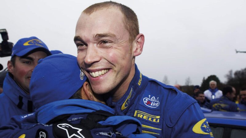 Richard Burns celebrates at Rally GB