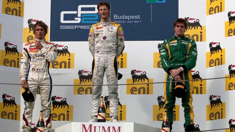 Romain Grosjean on the podium at 2011 GP2 race