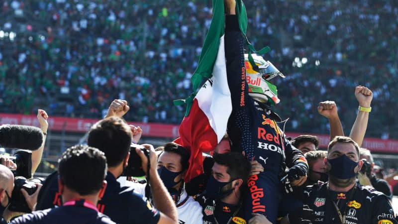 Sergio Perez celebrates finishing on the podium in the 2021 Mexican Grand Prix
