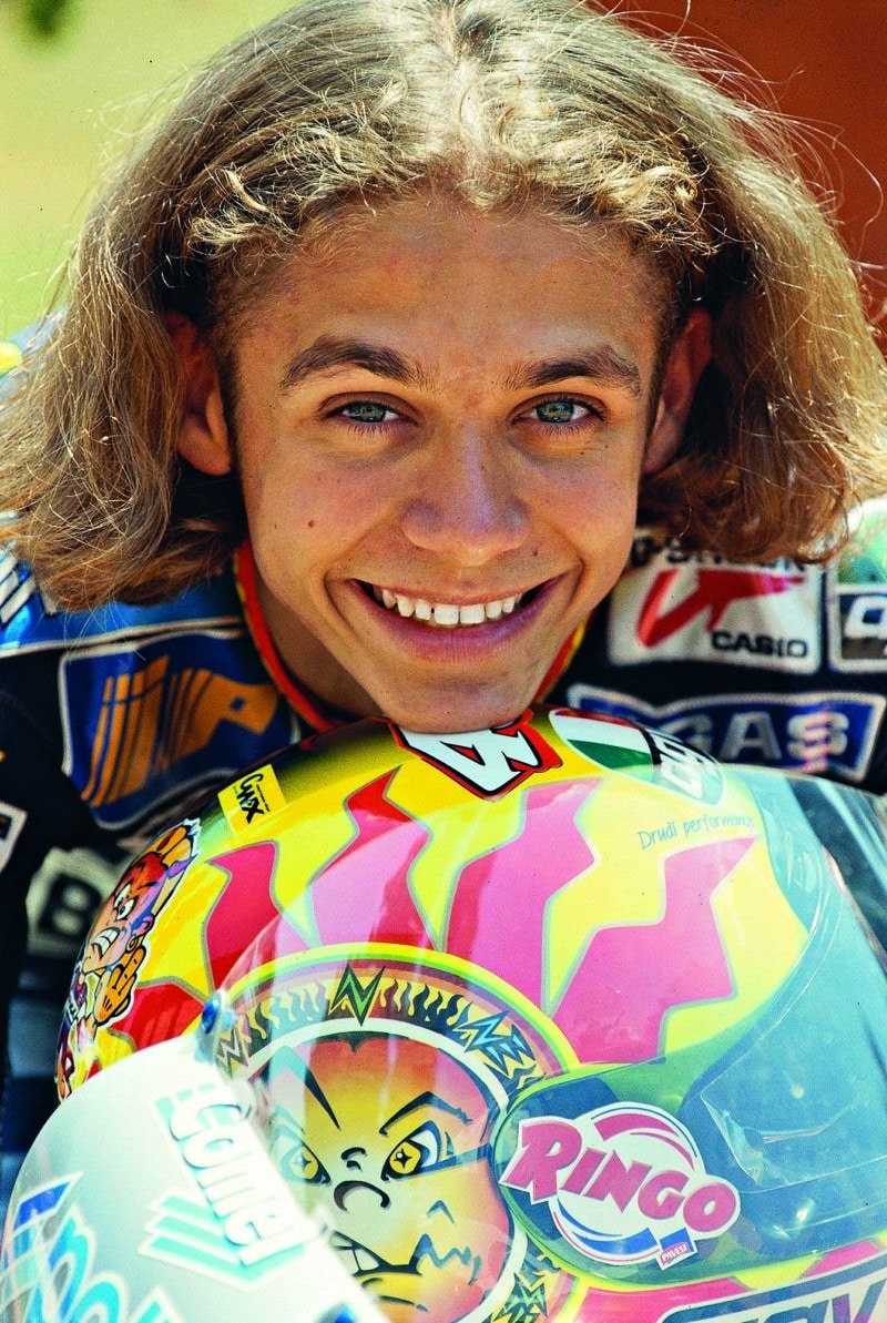 Valentino Rossi Leaning On his Helmet aged 18