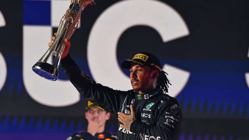 Lewis Hamilton lifts his trophy after winning the 2021 Saudi Arabian Grand Prix