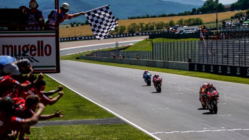 Danilo Petrucci crosses the line to win at Mugello in 2019 MotoGP race