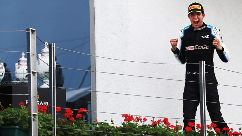 Esteban Ocon roars on the podium at the 2021 Hungarian Grand Prix
