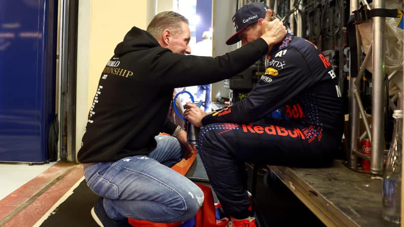 Jos Verstappen embraces Max after world championship victory