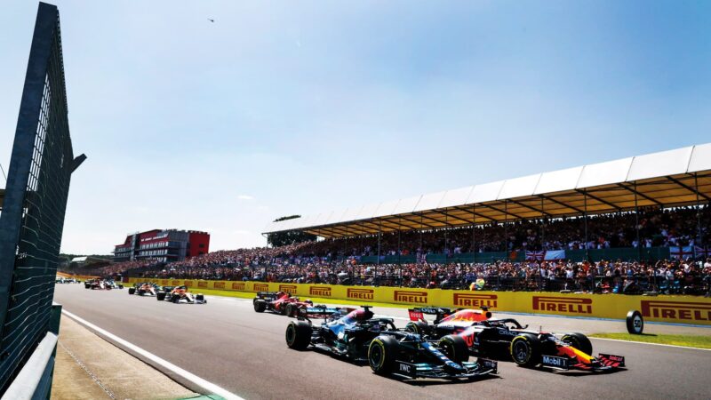 Max Verstappen and Lewis Hamilton side by side at the start of the 2021 British Grand Prix