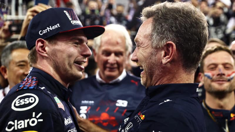 Max Verstappen celebrates winning the 2021 F1 championship with Christian Horner