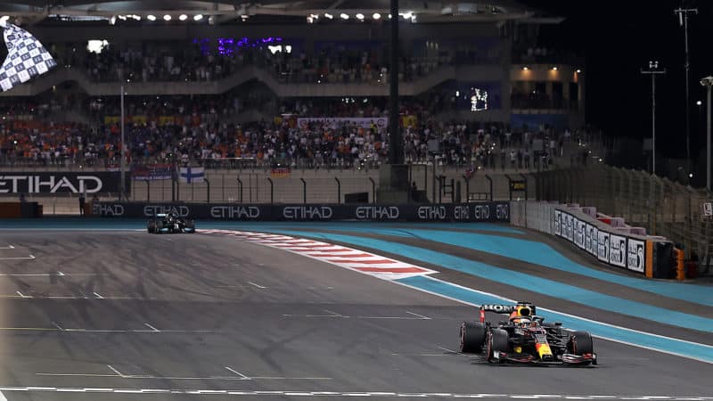 Max Verstappen crosses Abu Dhabi finish line to win the 2021 F1 world championship