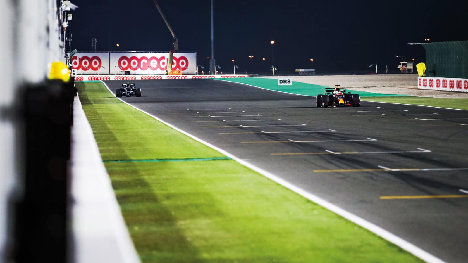 Max Verstappen drives past stranded Pierre Gasly in Qatar