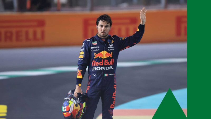 Red Bull's Mexican driver Sergio Perez reacts after a collision during the Formula One Saudi Arabian Grand Prix at the Jeddah Corniche Circuit in Jeddah on December 5, 2021. (Photo by Giuseppe CACACE / AFP) (Photo by GIUSEPPE CACACE/AFP via Getty Images)