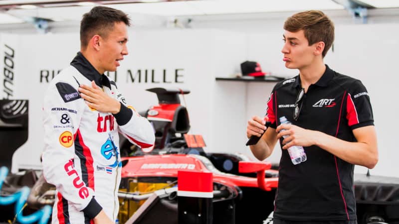 Alex Albon touches broken collarbone with George Russell